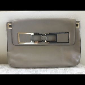 Anya hindmarch metal buckle clutch taupe tan